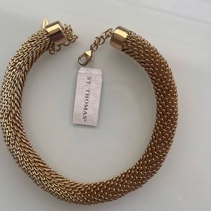 Saint Thomas necklace in gold never worn before.